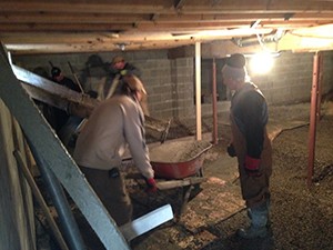 Bob Sohm's guys Jay and Wade helping Sam Scarfone (Sam's Cement finishing) when they poured the basement in the brown house